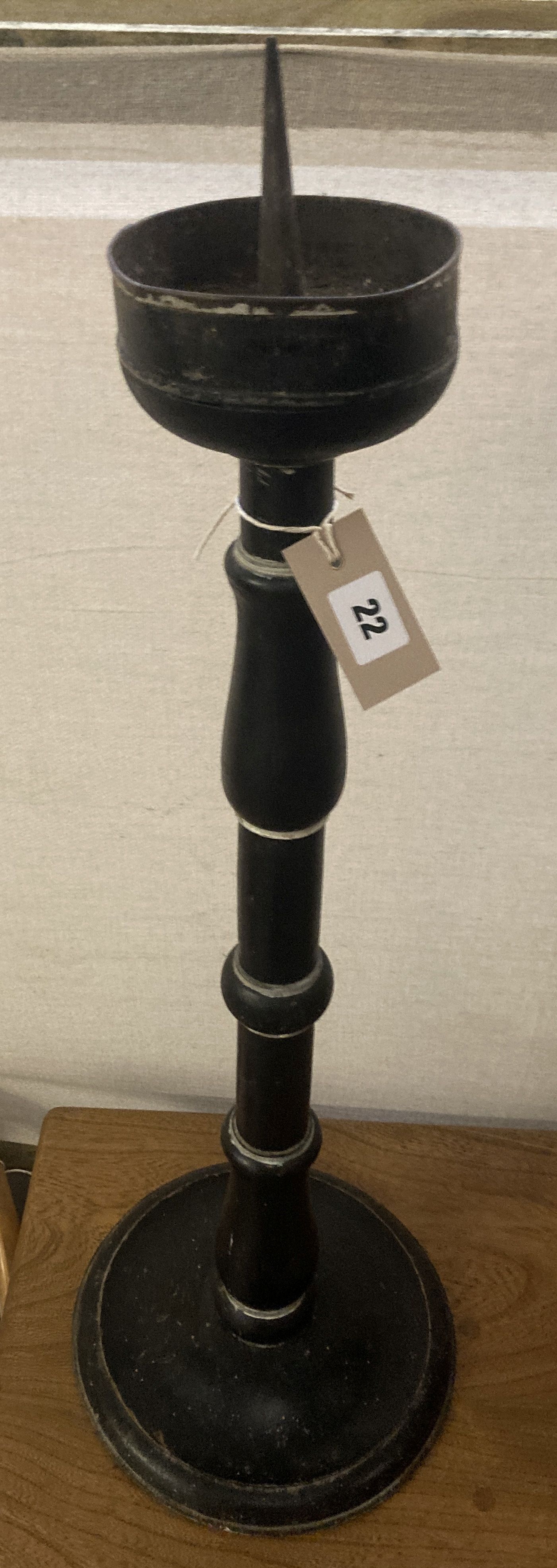 A painted turned wood pricket candlestick, height 75cm